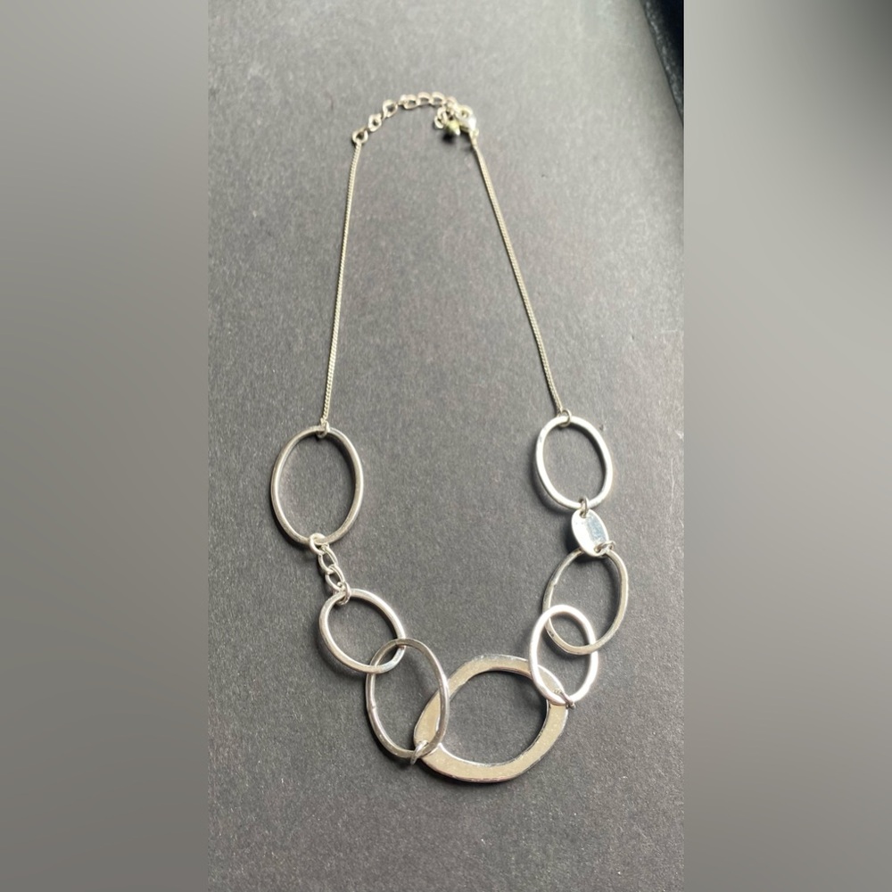 Silver toned concentric circle necklace